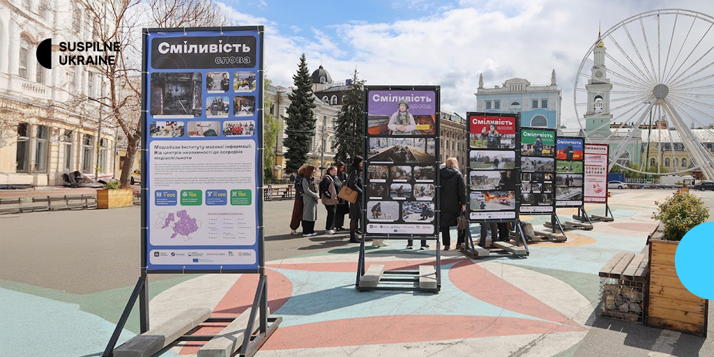 Photos of Suspilne Ukraine correspondents at work are included in an exhibition on war journalism